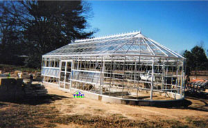 Nacogdoches, TX - American Classic 17' x 40' w/custom rounded endwalls white (pre-landscape) -2